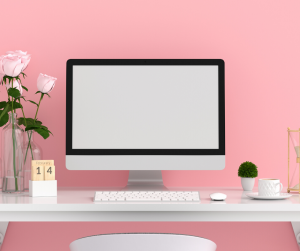Pink background with desk